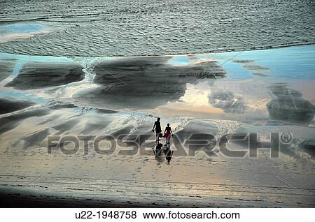 Jericoacoara, CearB, Brazil, couple walking along the seashore at sunset View Large Photo Image Stock Photo - Jericoacoara, CearB, Brazil, couple walking along the seashore at sunset. Fotosearch