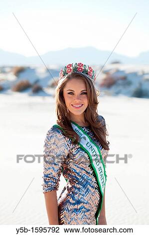 Jessica Martin, Miss New Mexico 2012 posing at White Sands, New Mexico, wearing an evening dress, sash and crown from her reign as Miss Fire from the 2011 Miss Earth Pageant View Large Photo Image Stock Image - Jessica Martin, Miss New Mexico 2012 posing at White Sands, New Mexico, wearing an evening dress, sash and crown from her reign as Miss Fire from the 2011 Miss Earth Pageant. Fotosearch