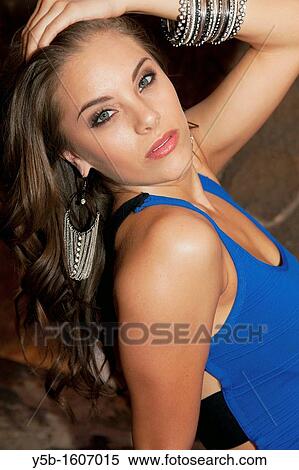 Stock Photography - Jessica Martin, Miss New Mexico 2012 posing in front of stone walls. Fotosearch