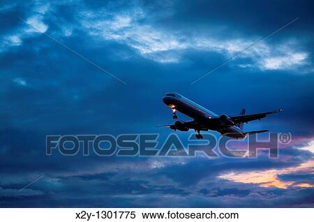 Jet airplane in flight. View Large Photo Image Stock Photography - Jet airplane in flight.. Fotosearch