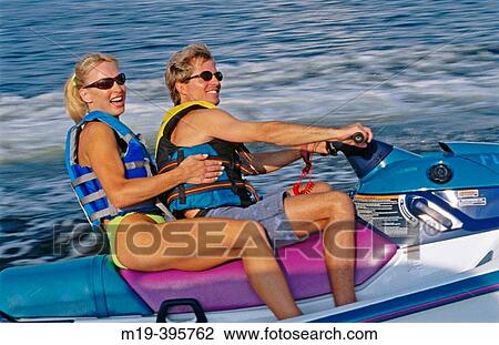 jet ski couple View Large Photo Image Stock Image - jet ski couple. Fotosearch