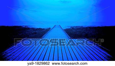 Stock Image - Jetty at night. Fotosearch