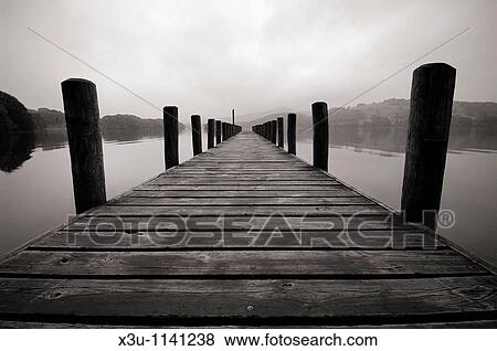 Jetty on Coniston Water in The Lake District National Park Cumbria England View Large Photo Image Stock Photo - Jetty on Coniston Water in The Lake District National Park Cumbria England. Fotosearch