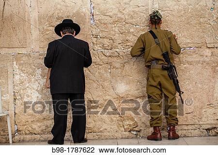 Jews offer prayers in Old City of Jerusalem at Western Wall View Large Photo Image Stock Image - Jews offer prayers in Old City of Jerusalem at Western Wall. Fotosearch