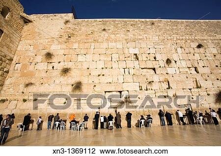 Stock Image - Jews praying, Western Wall, Wailing Wall, Old city, Jerusalem, Israel, Middle East.. Fotosearch