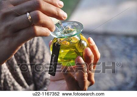 Jimbaran (Bali, Indonesia):? peace oil? used for massage at the Jimbaran Puri Bali luxury resort's spa View Large Photo Image Stock Image - Jimbaran (Bali, Indonesia):? peace oil? used for massage at the Jimbaran Puri Bali luxury resort's spa. Fotosearch