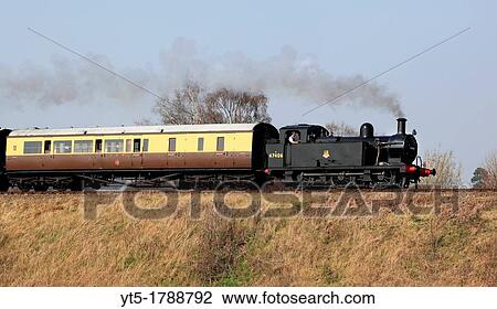 ? Jinty? 0-6-0 No 47406 Tank Engine heading towards Kidderminster on the Severn Valley Railway, Worcestershire, England, Europe View Large Photo Image Stock Image - ? Jinty? 0-6-0 No 47406 Tank Engine heading towards Kidderminster on the Severn Valley Railway, Worcestershire, England, Europe. Fotosearch