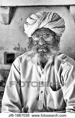 Jodhpur at Fort Mehrangarh in Rajasthan India man guard in doorway of Fort Palace in costume View Large Photo Image Stock Photo - Jodhpur at Fort Mehrangarh in Rajasthan India man guard in doorway of Fort Palace in costume. Fotosearch