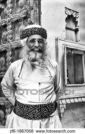 Jodhpur at Fort Mehrangarh in Rajasthan India a great image of bearded character man guard in doorway of Fort Palace in costume View Large Photo Image Stock Photo - Jodhpur at Fort Mehrangarh in Rajasthan India a great image of bearded character man guard in doorway of Fort Palace in costume. Fotosearch