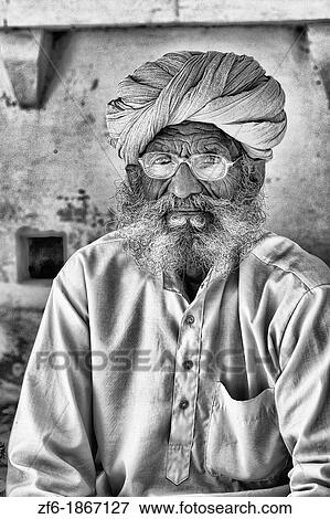 Jodhpur at Fort Mehrangarh in Rajasthan India man guard in doorway of Fort Palace in costume View Large Photo Image Stock Photo - Jodhpur at Fort Mehrangarh in Rajasthan India man guard in doorway of Fort Palace in costume. Fotosearch