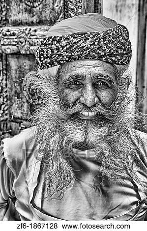 Jodhpur at Fort Mehrangarh in Rajasthan India a great image of bearded character man guard in doorway of Fort Palace in costume View Large Photo Image Stock Photo - Jodhpur at Fort Mehrangarh in Rajasthan India a great image of bearded character man guard in doorway of Fort Palace in costume. Fotosearch