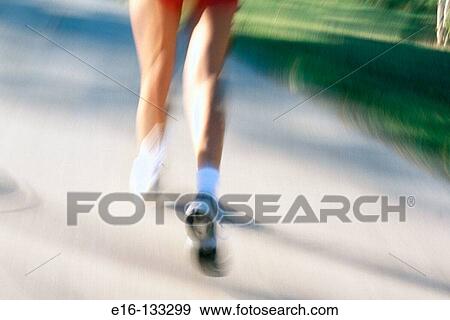 Jogger in the park View Large Photo Image Stock Photo - Jogger in the park. Fotosearch