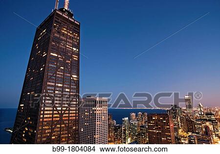 Picture - JOHN HANCOCK TOWER LOOP SKYLINE FROM 900 NORTH MICHIGAN ROOFTOP DOWNTOWN CHICAGO ILLINOIS USA. Fotosearch