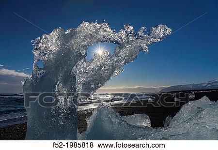 Stock Photo - Jokulsarlon beach, Vatnatjokull glacier, Southern Iceland, Iceland, Europe.. Fotosearch