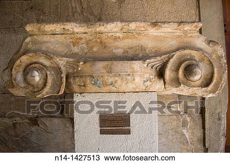 Jonic Column Capital in the Stoa of Attalos, now the museum of Ancient Agora, in Plaka district, Athens, Greece. View Large Photo Image Stock Image - Jonic Column Capital in the Stoa of Attalos, now the museum of Ancient Agora, in Plaka district, Athens, Greece.. Fotosearch