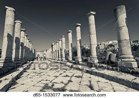 Jordan, Jerash, overview of Roman-era city ruins, columns along the Cardo Maximus View Large Photo Image Stock Photo - Jordan, Jerash, overview of Roman-era city ruins, columns along the Cardo Maximus. Fotosearch