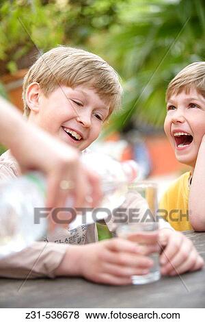 Stock Photo - Joshua, Yanik, Grinning, Glass, Water,. Fotosearch