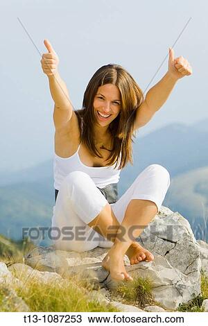 Joy of life - young woman dressed in White View Large Photo Image Stock Image - Joy of life - young woman dressed in White. Fotosearch