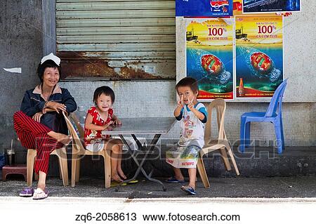 Joyful Children in the Streets of Ho Chi Minh City, Vietnam. View Large Photo Image Stock Image - Joyful Children in the Streets of Ho Chi Minh City, Vietnam.. Fotosearch