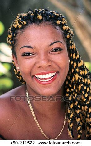 Joyful looking girl with beads, Curacao View Large Photo Image Stock Image - Joyful looking girl with beads, Curacao. Fotosearch