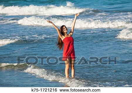 Joyful youth at beach View Large Photo Image Stock Photograph - Joyful youth at beach. Fotosearch