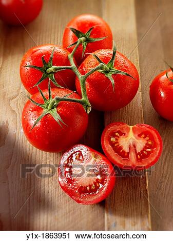 Jubilee vine tomatoes View Large Photo Image Stock Image - Jubilee vine tomatoes. Fotosearch
