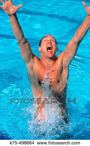 Picture - Jumping for joy in water. Fotosearch