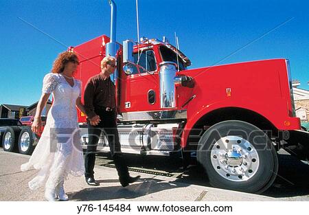 Picture - Just married trucker and wife, L. A. Fotosearch