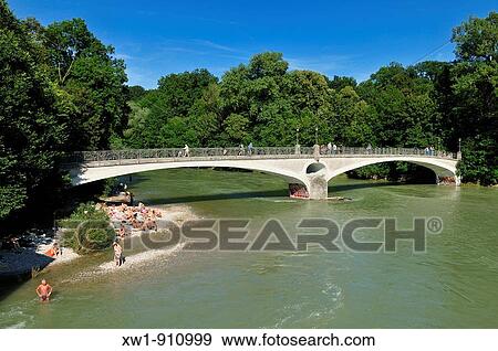 Kabelsteg bridge over the Isar river with beach, Munich, M? nchen, Bavaria, Germany, Europe View Large Photo Image Stock Photo - Kabelsteg bridge over the Isar river with beach, Munich, M? nchen, Bavaria, Germany, Europe. Fotosearch