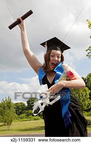 Kalamazoo, Michigan - A student celebrates after her graduation ceremony at Western Michigan University View Large Photo Image Stock Image - Kalamazoo, Michigan - A student celebrates after her graduation ceremony at Western Michigan University. Fotosearch