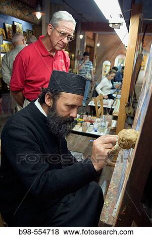 Kalambaka, Greece, Father Pefki, a monk and icon painter in ihs studio and showroom near Meteora. View Large Photo Image Stock Photo - Kalambaka, Greece, Father Pefki, a monk and icon painter in ihs studio and showroom near Meteora.. Fotosearch