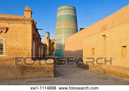 Kalta Minor minaret in the historic adobe oldtown of Khiva, Chiva, Unesco World Heritage Site, Uzbekistan, Central Asia View Large Photo Image Stock Photo - Kalta Minor minaret in the historic adobe oldtown of Khiva, Chiva, Unesco World Heritage Site, Uzbekistan, Central Asia. Fotosearch