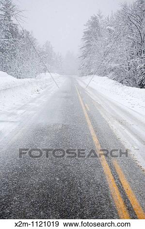 Kancamagus Highway route 112, which is one of New England's scenic byways in blizzard conditions Located in the White Mountains, New Hampshire USA View Large Photo Image Stock Photo - Kancamagus Highway route 112, which is one of New England's scenic byways in blizzard conditions Located in the White Mountains, New Hampshire USA. Fotosearch