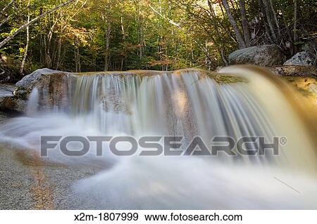 Kancamagus Scenic Byway - Swift River during the late summer months in the White Mountains, New Hampshire USA View Large Photo Image Stock Photo - Kancamagus Scenic Byway - Swift River during the late summer months in the White Mountains, New Hampshire USA. Fotosearch