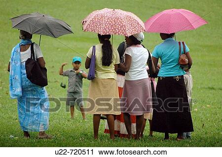 Kandy Sri Lanka: women with umbrellas at the Royal Botanic Gardens View Large Photo Image Stock Image - Kandy Sri Lanka: women with umbrellas at the Royal Botanic Gardens. Fotosearch