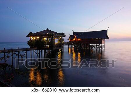 Kapalai resort at Kapalai Island at sunset, Borneo, Malaysia View Large Photo Image Stock Image - Kapalai resort at Kapalai Island at sunset, Borneo, Malaysia. Fotosearch