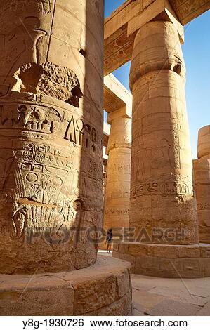 Karnak - Hypostyle Hall in Amun-Re Temple, complex of temples at Karnak, Upper Egypt View Large Photo Image Stock Photograph - Karnak - Hypostyle Hall in Amun-Re Temple, complex of temples at Karnak, Upper Egypt. Fotosearch
