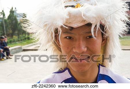 Kathmandu Nepal Nepali boys dance in traditional Tibetan ceremonial costumes and masks in Nayapti, Eastern Kathmandu 1. View Large Photo Image Stock Image - Kathmandu Nepal Nepali boys dance in traditional Tibetan ceremonial costumes and masks in Nayapti, Eastern Kathmandu 1.. Fotosearch
