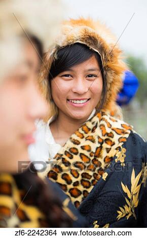 Picture - Kathmandu Nepal Nepali girl dance in traditional Tibetan ceremonial costumes and masks in Nayapti, Eastern Kathmandu 1.. Fotosearch