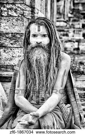 Kathmandu Nepal religious man who is a character painted in costume near river at famous Pashupatinath holi Hindu place on Bagmati River View Large Photo Image Picture - Kathmandu Nepal religious man who is a character painted in costume near river at famous Pashupatinath holi Hindu place on Bagmati River. Fotosearch