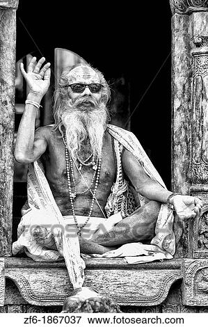 Kathmandu Nepal religious man who is a character painted in costume near river at famous Pashupatinath holi Hindu place on Bagmati River View Large Photo Image Stock Photo - Kathmandu Nepal religious man who is a character painted in costume near river at famous Pashupatinath holi Hindu place on Bagmati River. Fotosearch