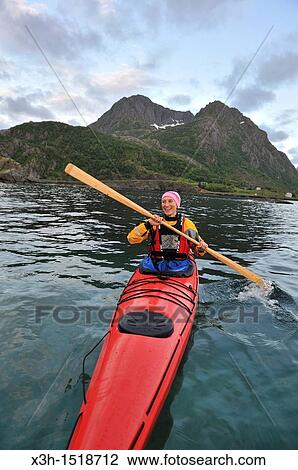 Stock Image - kayak at Hamn i Senja, Senja island, County of Troms, Norway, Northern Europe. Fotosearch