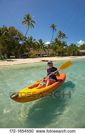 Kayaker, Plantation Island Resort, Malolo Lailai Island, Mamanuca Islands, Fiji, South Pacific View Large Photo Image Stock Image - Kayaker, Plantation Island Resort, Malolo Lailai Island, Mamanuca Islands, Fiji, South Pacific. Fotosearch