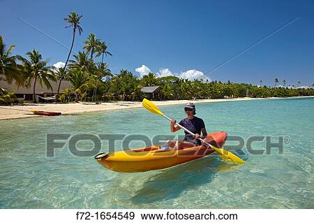 Kayaker, Plantation Island Resort, Malolo Lailai Island, Mamanuca Islands, Fiji, South Pacific View Large Photo Image Stock Photo - Kayaker, Plantation Island Resort, Malolo Lailai Island, Mamanuca Islands, Fiji, South Pacific. Fotosearch