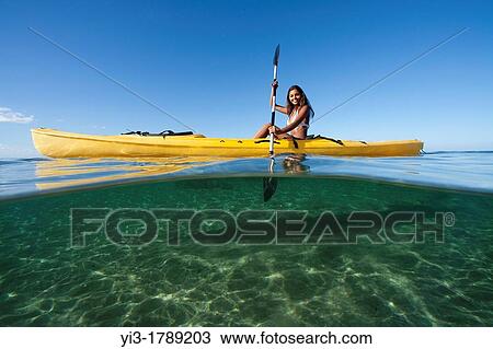Stock Image - Kayaking at Lahaina, Maui, Hawaii Above and below view. Fotosearch