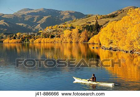 Kayaking on Lake Hayes near Arrowtown Central Otago New Zealand View Large Photo Image Stock Photograph - Kayaking on Lake Hayes near Arrowtown Central Otago New Zealand. Fotosearch