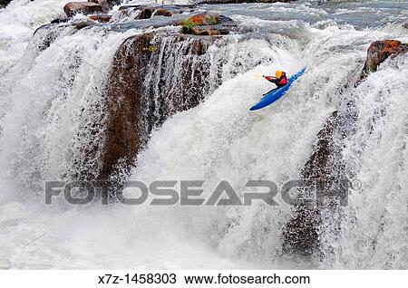 Stock Image - Kayaking Star Falls which is rated Class 6 on the Murtaugh section of The Snake River near the town of Murtaugh in southern Idaho. Fotosearch