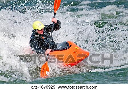 Kayaking The Wave a rapid which is rated Class 4 on The Snake River near the town of Hagerman in southern Idaho View Large Photo Image Stock Photo - Kayaking The Wave a rapid which is rated Class 4 on The Snake River near the town of Hagerman in southern Idaho. Fotosearch