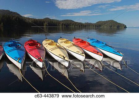 Kayaks at anchorage in Southeast Alaska. View Large Photo Image Stock Photo - Kayaks at anchorage in Southeast Alaska.. Fotosearch