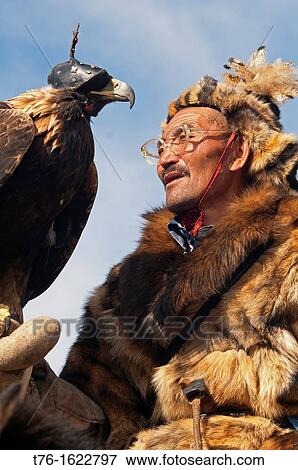 Kazakh eagle hunter and his golden eagle in the Altai Region of Bayan-? lgii in Western Mongolia View Large Photo Image Stock Photo - Kazakh eagle hunter and his golden eagle in the Altai Region of Bayan-? lgii in Western Mongolia. Fotosearch